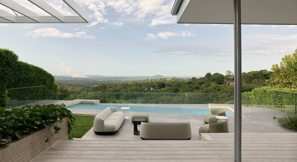 This is an example of a midcentury pool in Sunshine Coast.