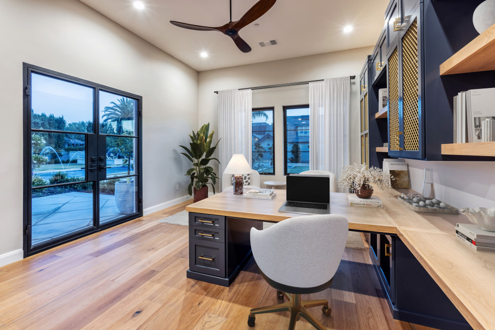 Built In Wood Desk & Black-Framed Glass Doors Home Office | French Country Trans