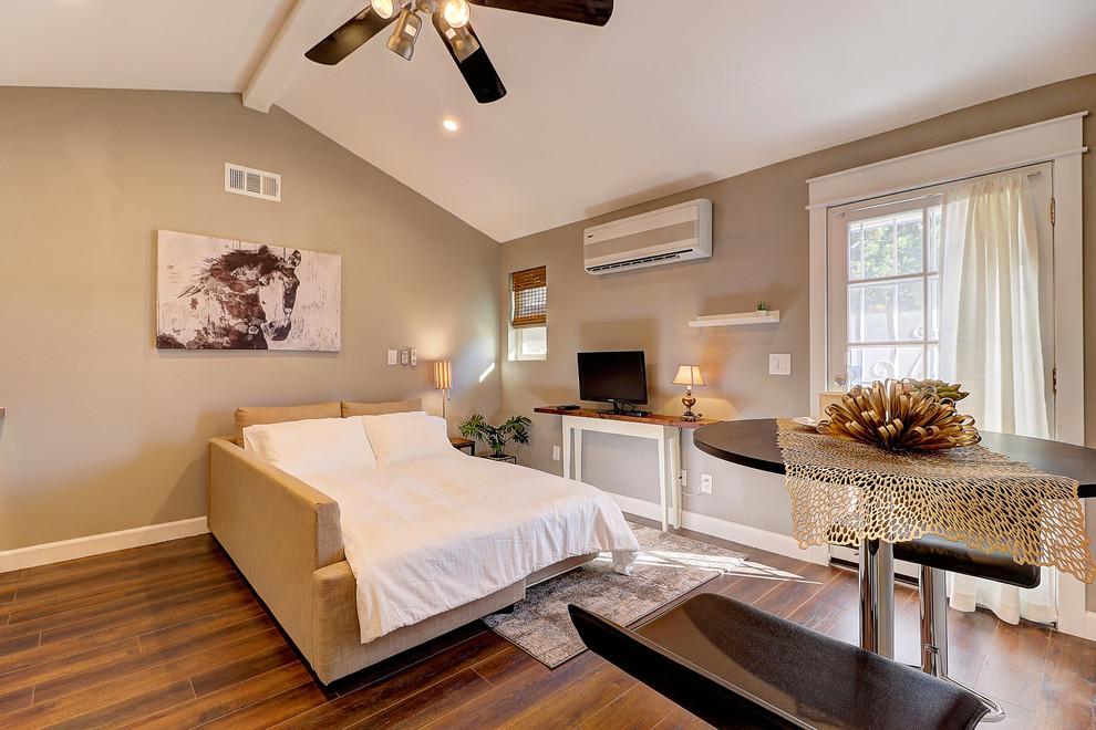 This is an example of a small transitional bedroom in Phoenix.