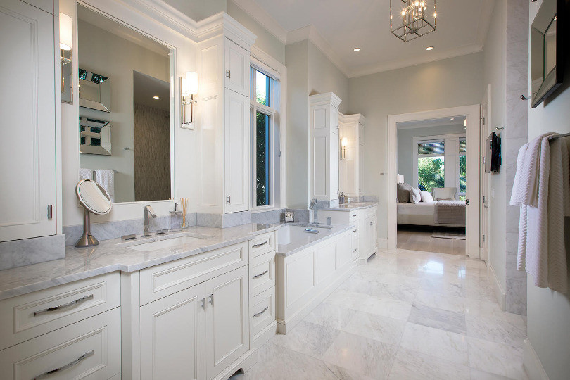 This is an example of a master bathroom in Other with furniture-like cabinets, grey cabinets, a freestanding tub, a double shower, white tile, an undermount sink and multi-coloured floor.