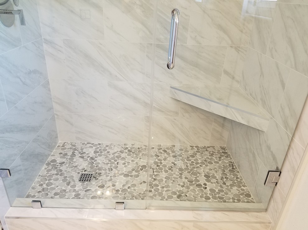 Inspiration for a modern bathroom in Orange County with an alcove shower, marble floors, grey floor and a hinged shower door.