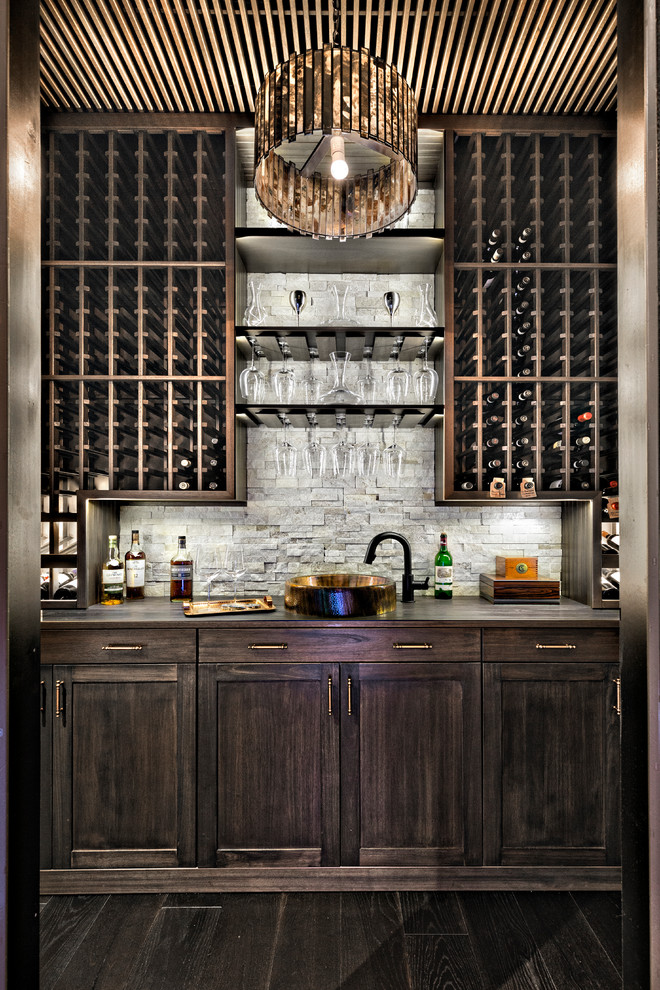 Inspiration for a transitional wine cellar in Miami with dark hardwood floors.