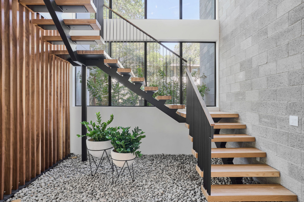 Inspiration for a modern staircase remodel in Austin