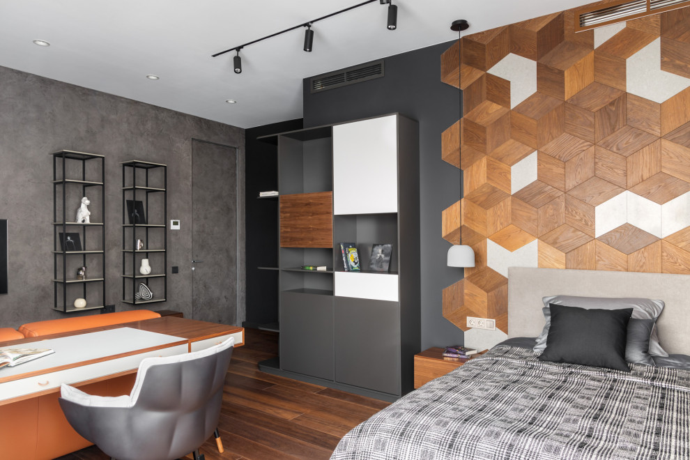 Photo of a large contemporary kids' room for boys in Moscow with black walls, medium hardwood floors and brown floor.