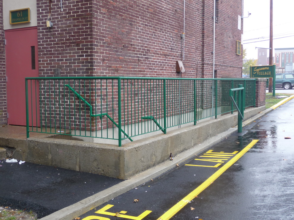 Minimalist straight metal railing staircase photo