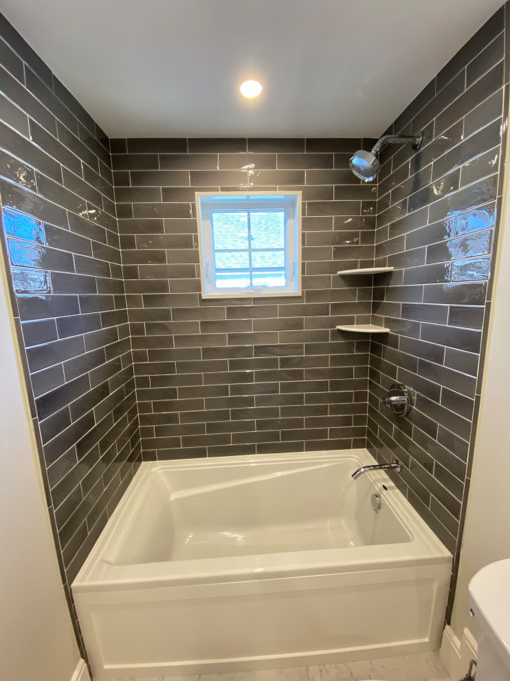 Example of a transitional home design design in Boston