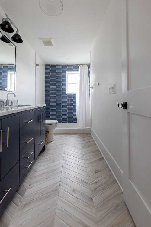 Bathroom cabinets color in dark navy blue representing the Water element, showing caution in Feng Shui design