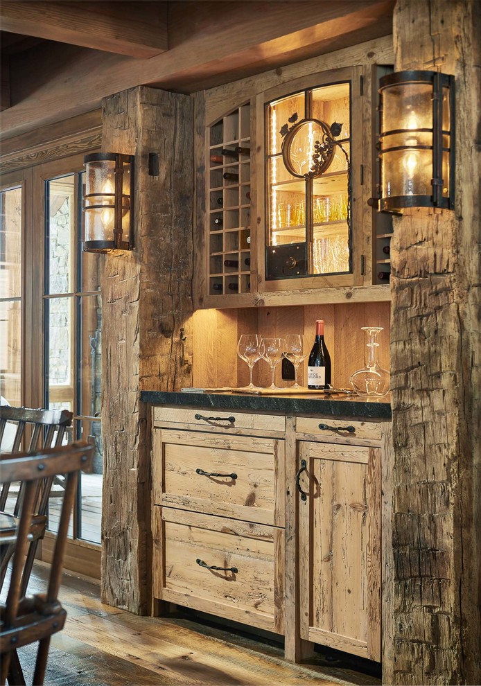 This is an example of a country home bar in Burlington.