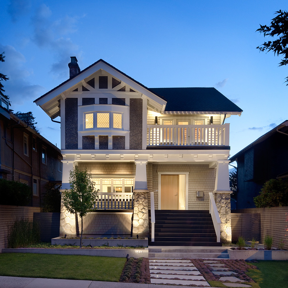 This is an example of a traditional two-storey exterior in Vancouver with a gable roof.