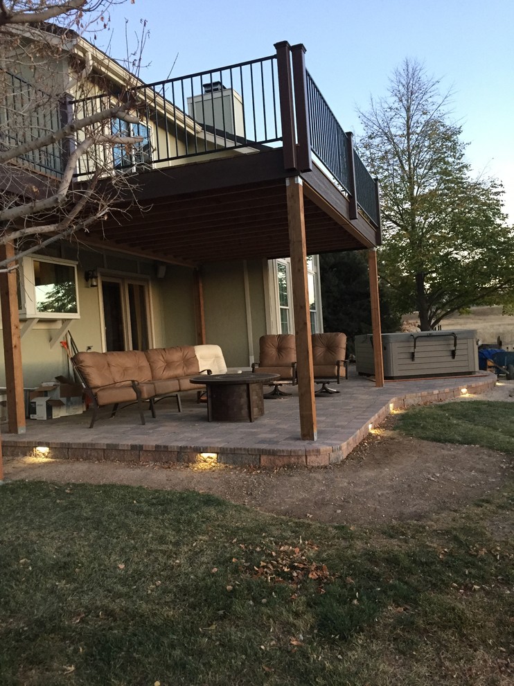 Inspiration for an arts and crafts deck in Denver with metal railing.