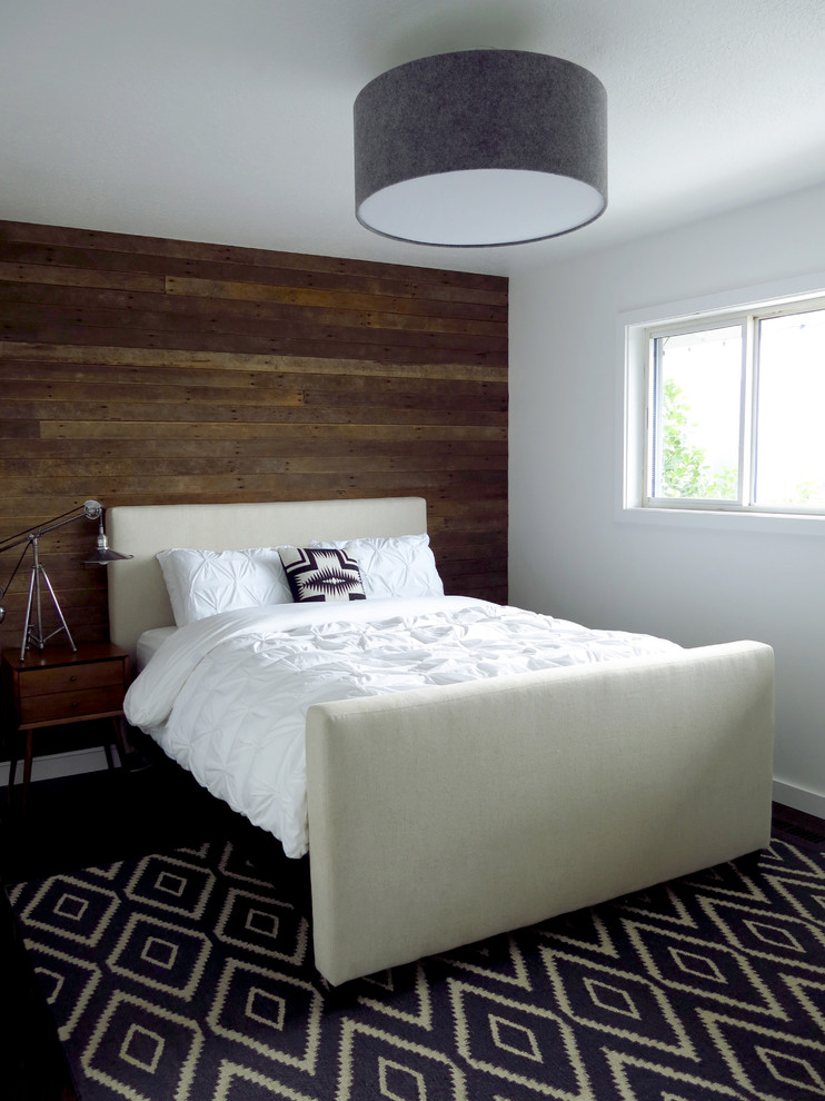 Contemporary bedroom in Portland with white walls.