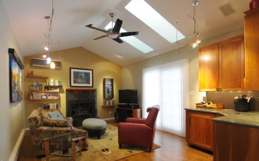 Example of a transitional home design design in Denver