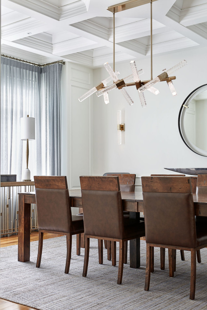Design ideas for a large eclectic dining room in Toronto with white walls, light hardwood floors and coffered.