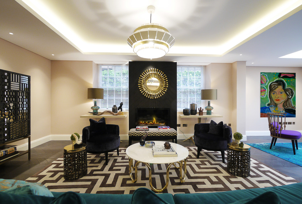 Large eclectic living room in London with dark hardwood floors and coffered.