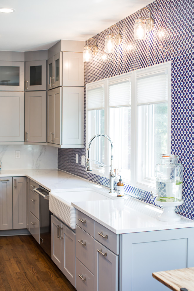 Eat-in kitchen - huge transitional u-shaped eat-in kitchen idea in Denver with shaker cabinets, gray cabinets, quartz countertops, blue backsplash, no island and white countertops
