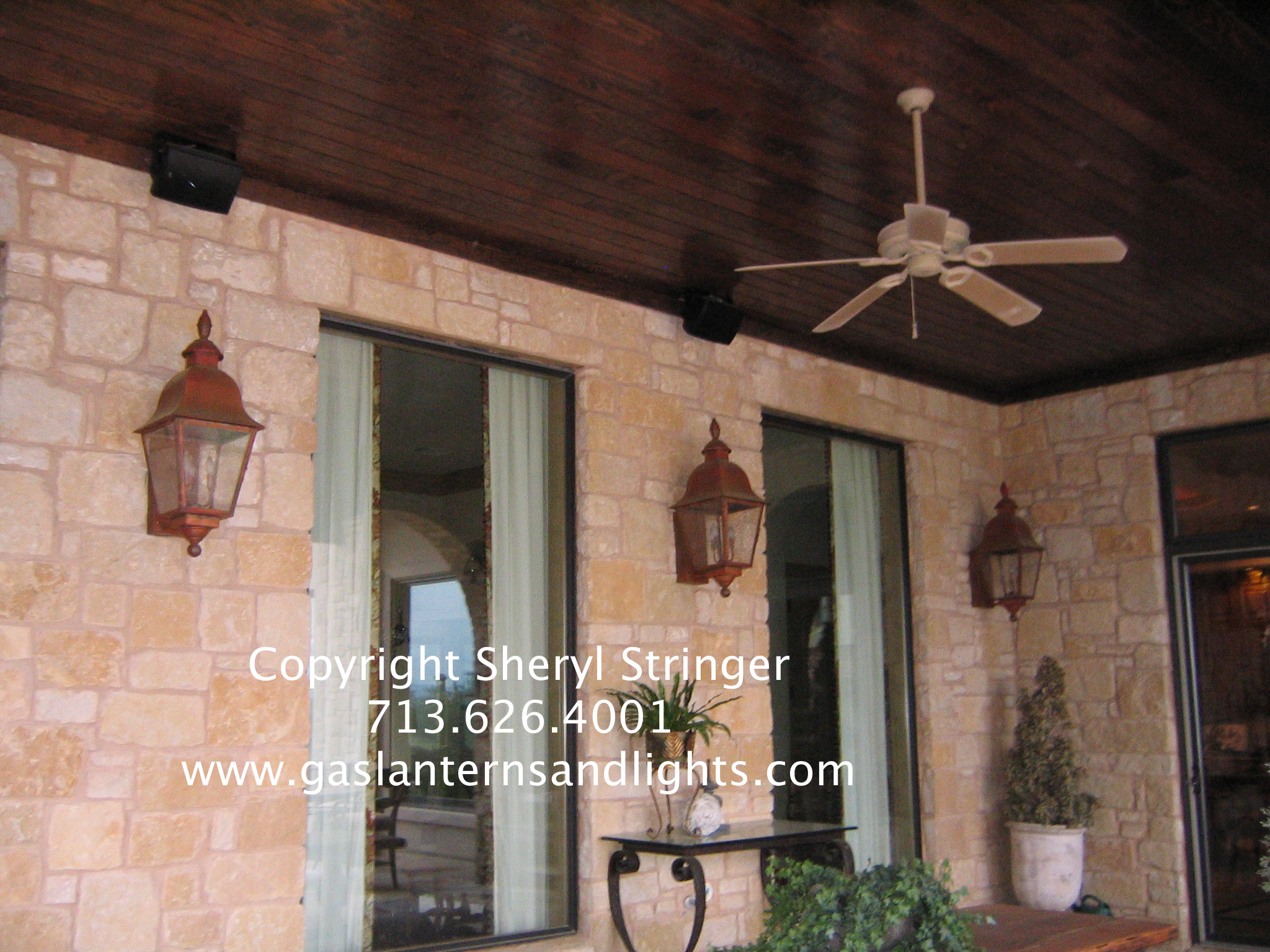 Sheryl's Electric Tuscan Lanterns on Porch