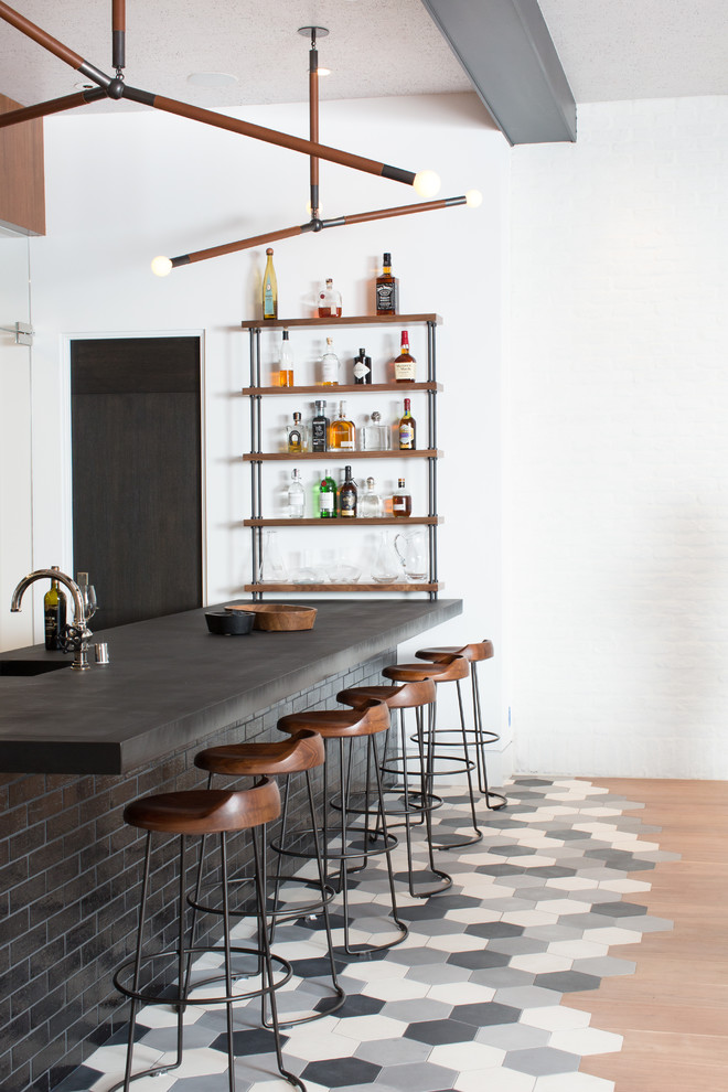 Contemporary wet bar in Orange County with concrete benchtops and multi-coloured floor.
