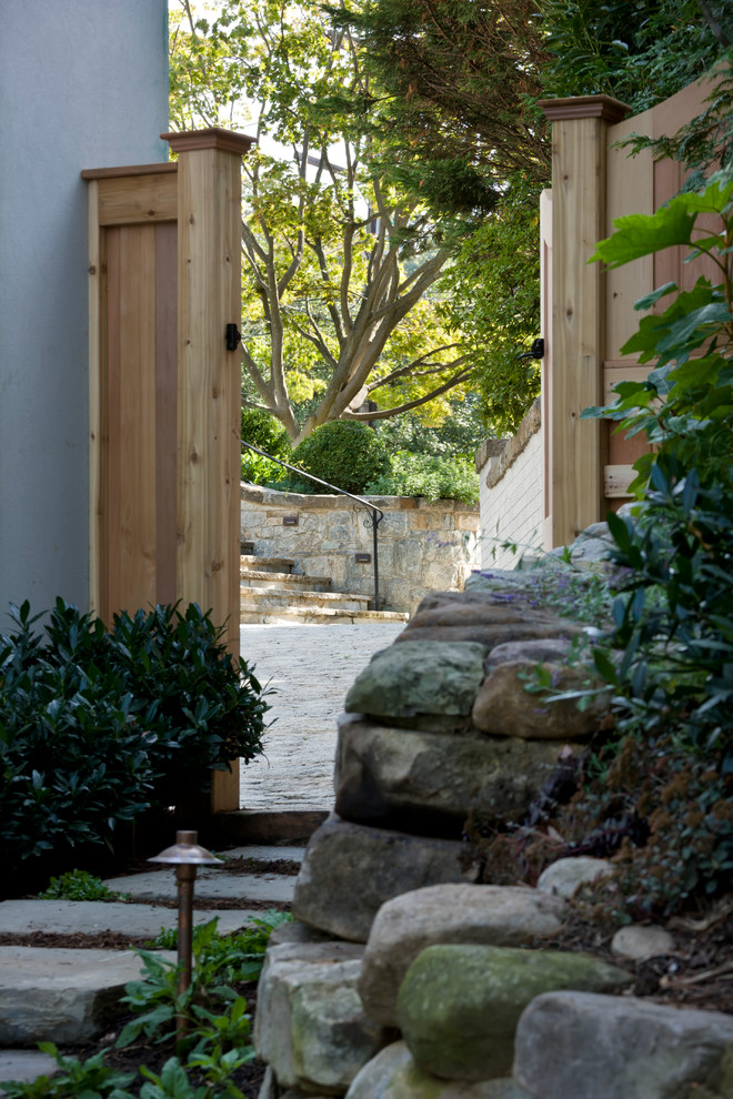 Design ideas for a transitional backyard driveway in DC Metro.