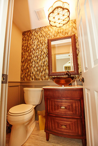 Bathroom - transitional bathroom idea in Phoenix with furniture-like cabinets, medium tone wood cabinets and a vessel sink