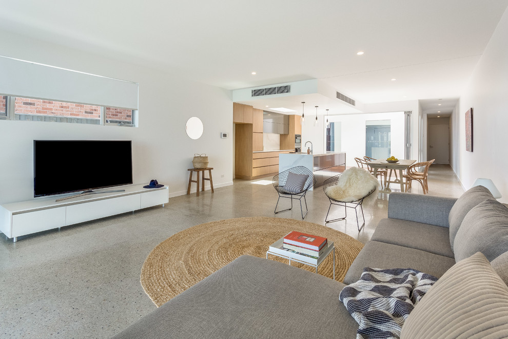 Beach style living room in Newcastle - Maitland.
