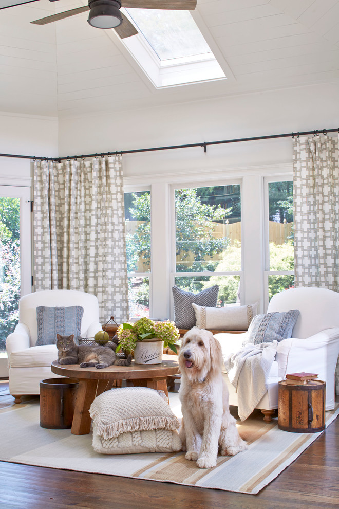 Inspiration for a country dark wood floor living room remodel in Atlanta with white walls, no fireplace and no tv