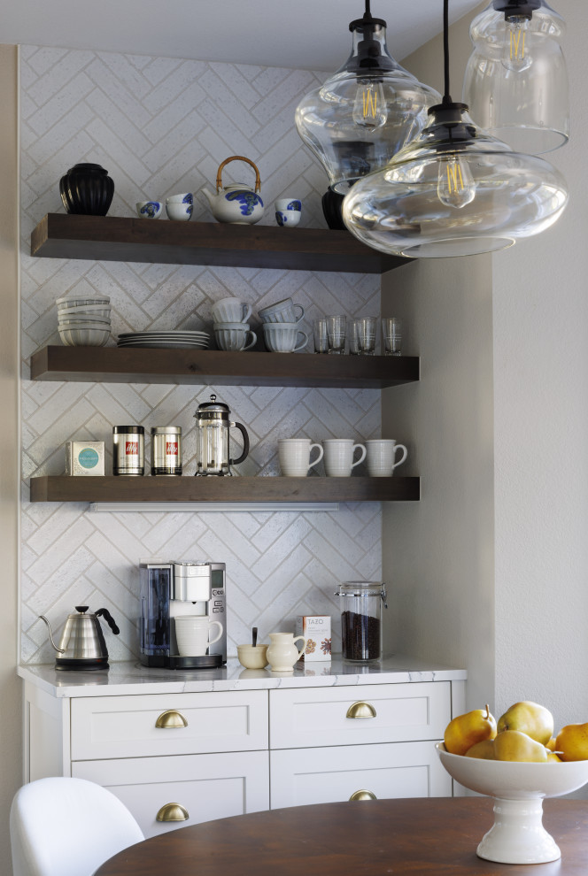 Example of a transitional kitchen design in Denver