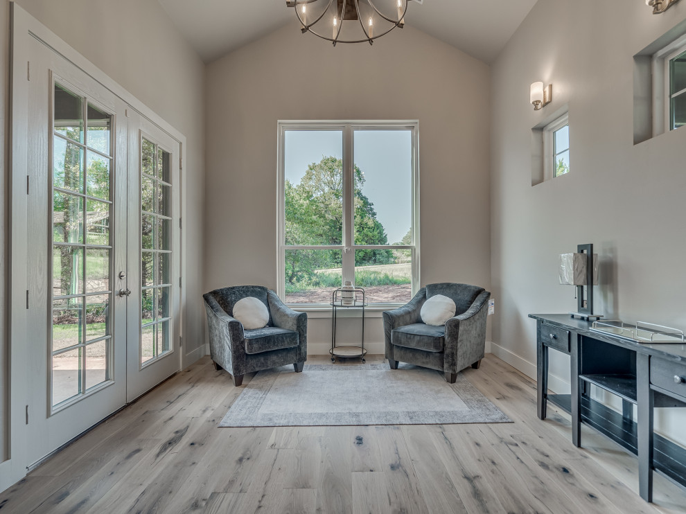 Inspiration for a large farmhouse medium tone wood floor and brown floor sunroom remodel in Oklahoma City with a standard ceiling