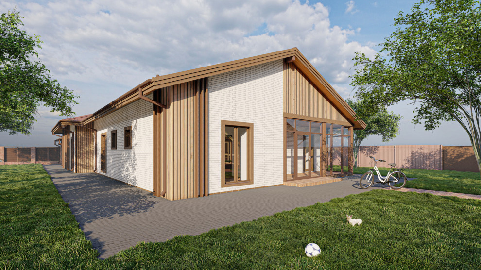 Одноэтажный дом с двумя встроенными гаражами в Лаишево