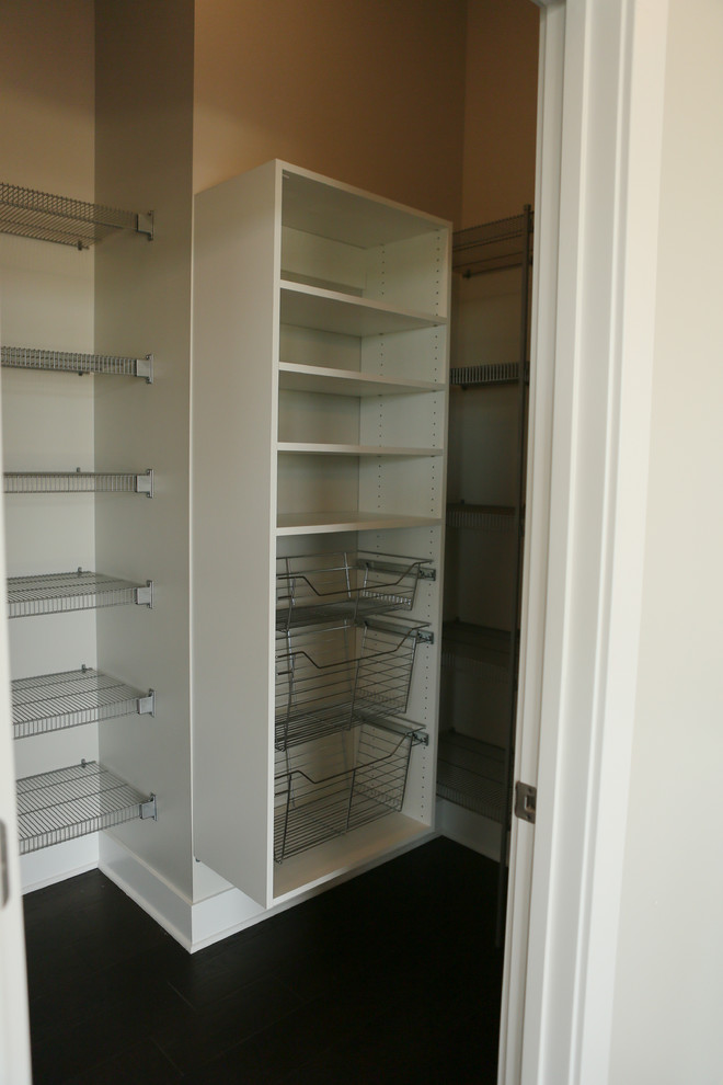 Example of a mid-sized transitional gender-neutral dark wood floor home design design in Chicago with white cabinets