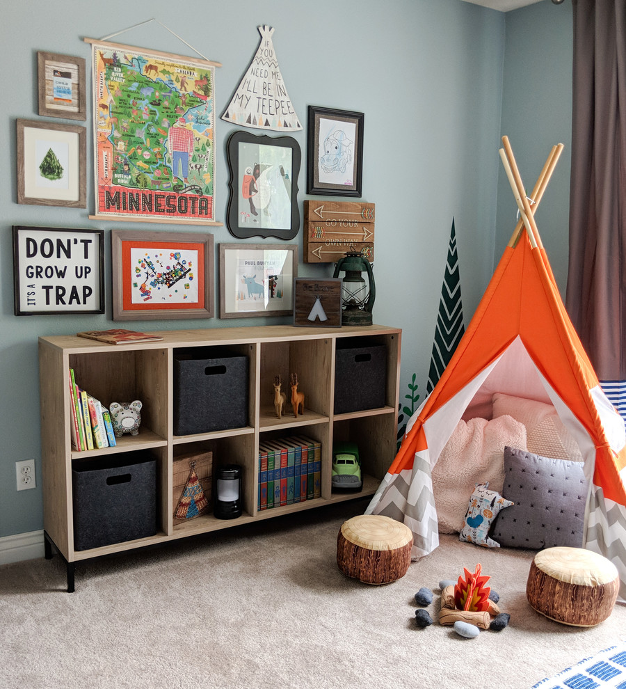 Inspiration for a mid-sized transitional kids' bedroom for kids 4-10 years old and boys in Other with blue walls, carpet and beige floor.