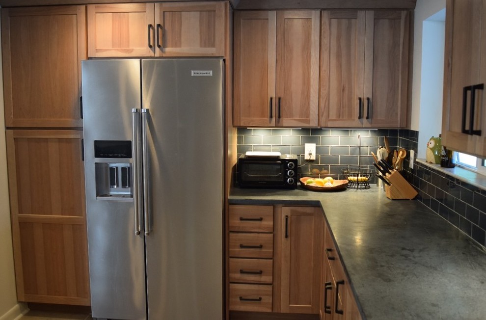 Example of a mountain style kitchen design in Denver
