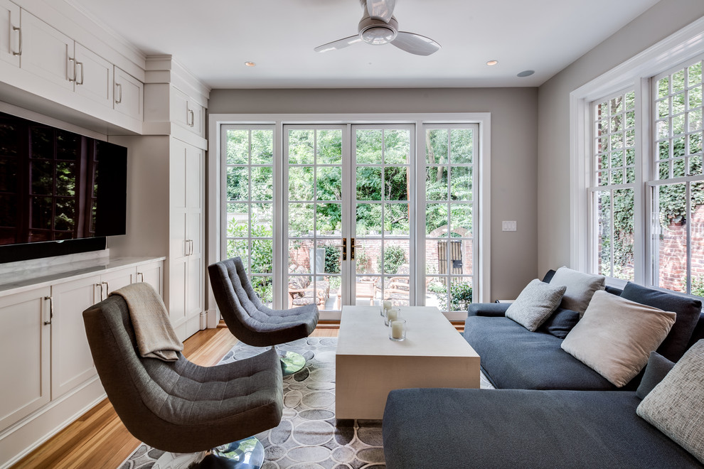 Design ideas for a transitional family room in DC Metro.