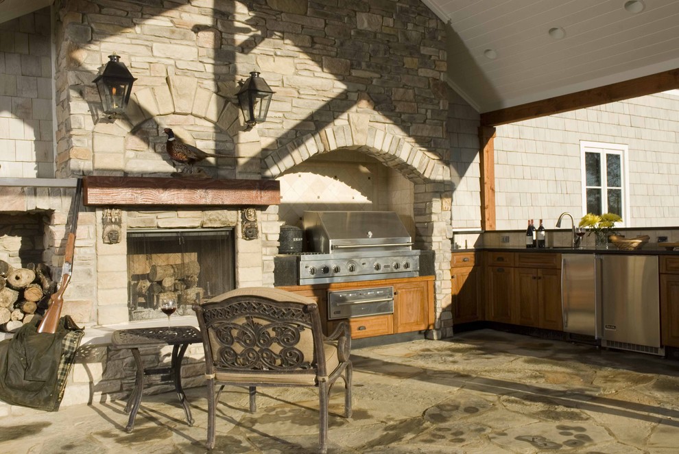 Inspiration for a traditional patio in Other with a fire feature and a pergola.