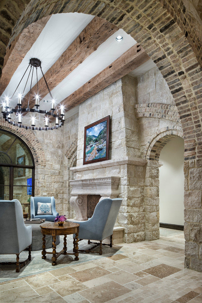 This is an example of a large mediterranean formal open concept living room in Austin.