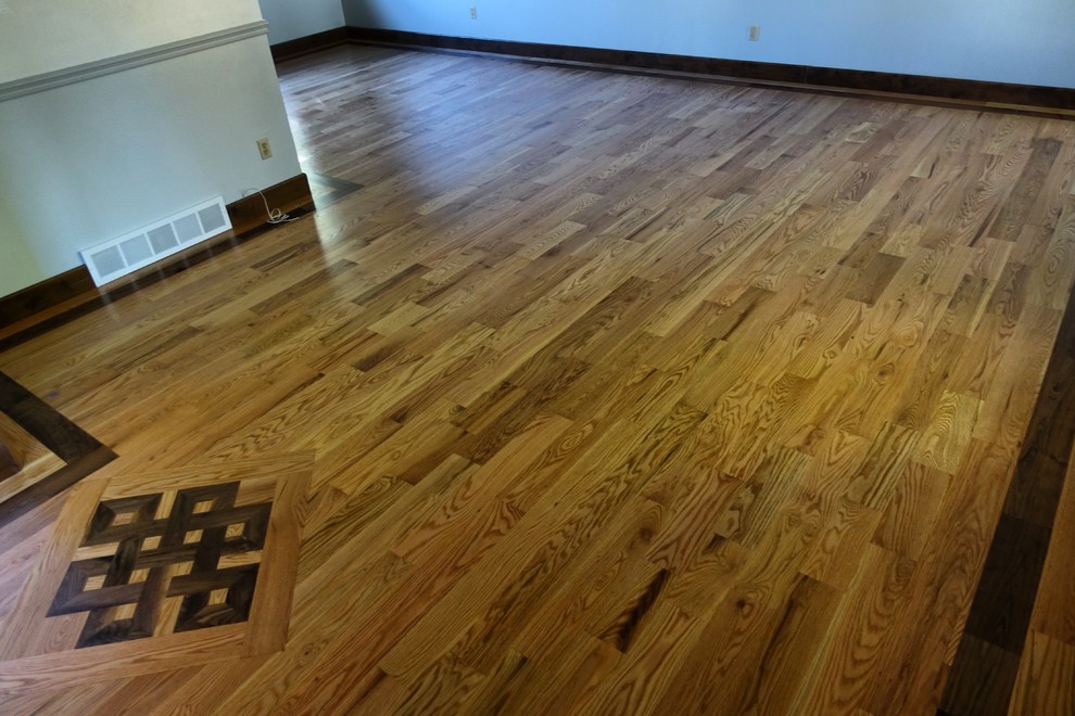 Inspiration for a mid-sized victorian light wood floor front door remodel in Denver