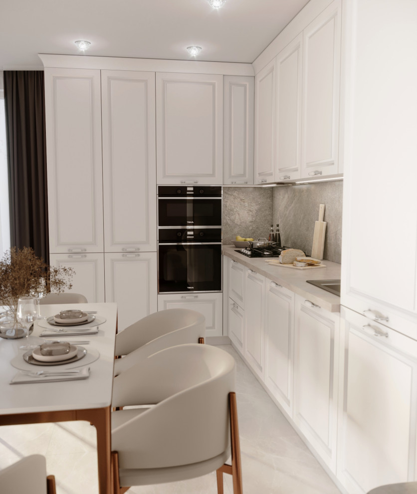 Photo of a medium sized traditional grey and white l-shaped open plan kitchen in Moscow with white cabinets, wood worktops, grey splashback, black appliances, no island and beige worktops.
