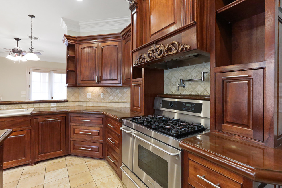 This is an example of a large mediterranean kitchen in New Orleans.