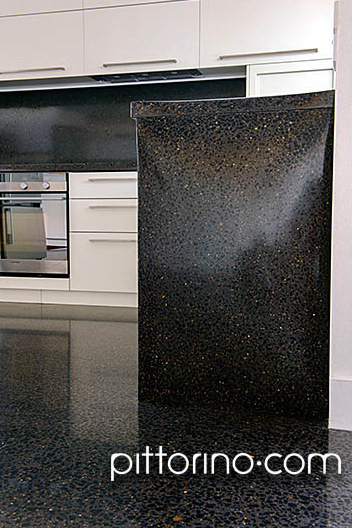 fully exposed & sculpted concrete benchtops, waterfall piece and splashback contemporary-kitchen
