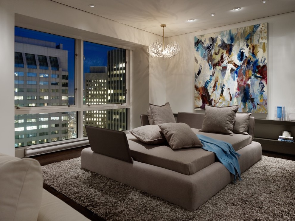 This is an example of a contemporary bedroom in San Francisco with white walls.