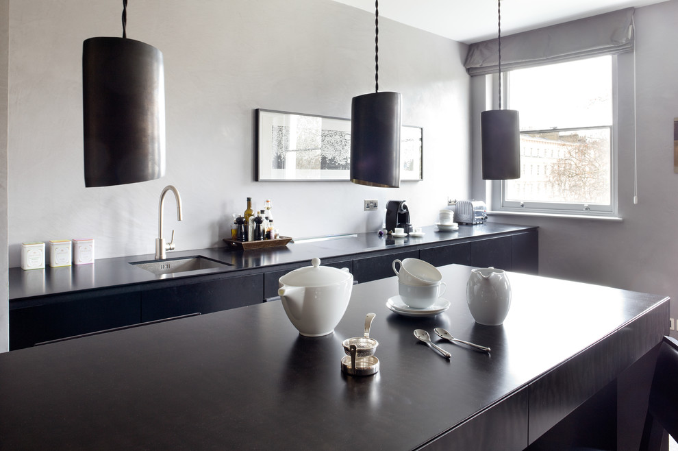 This is an example of a small contemporary kitchen in London.