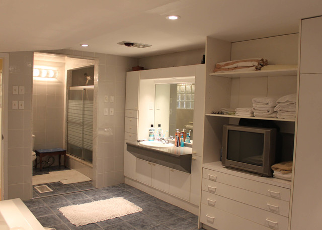 No wasted space! Custom sliding drawer under the bathroom sink