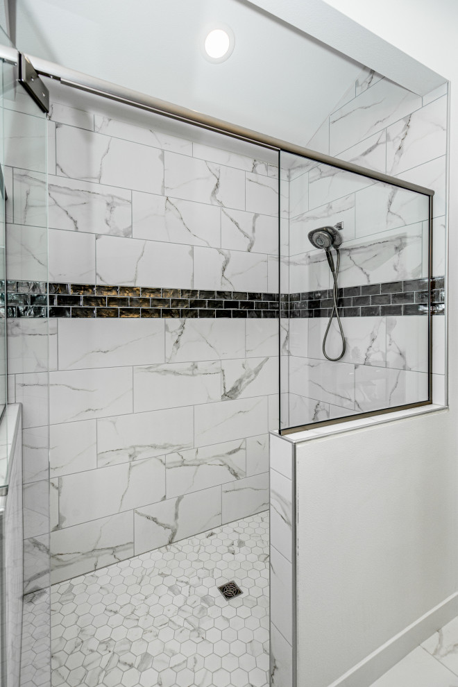 Inspiration for a classic ensuite bathroom in Other with a walk-in shower, black and white tiles, white walls, a hinged door, an enclosed toilet, a vaulted ceiling, brown cabinets, a freestanding bath, a one-piece toilet, ceramic tiles, ceramic flooring, white floors, double sinks and a built in vanity unit.