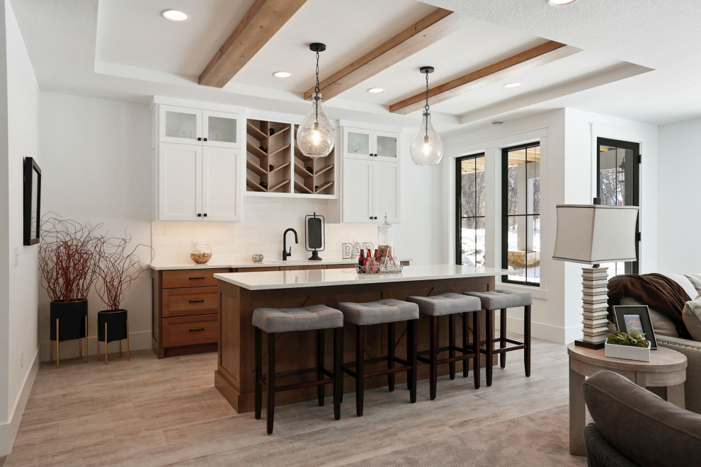 Example of a cottage home bar design in Minneapolis