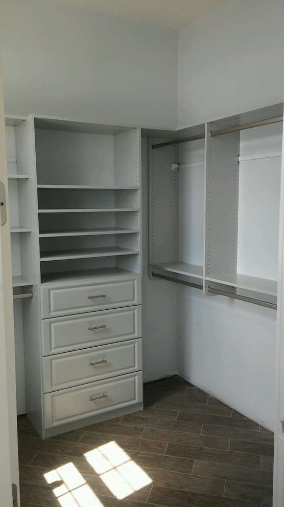 This is an example of a mid-sized contemporary storage and wardrobe in Orlando.