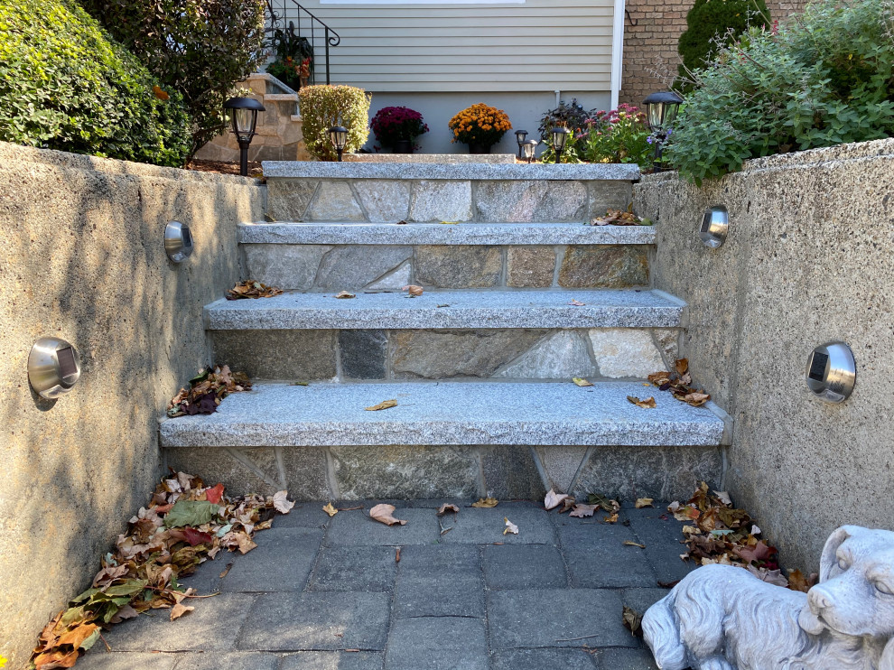 Photo of a medium sized traditional front partial sun garden in Boston with a rockery.