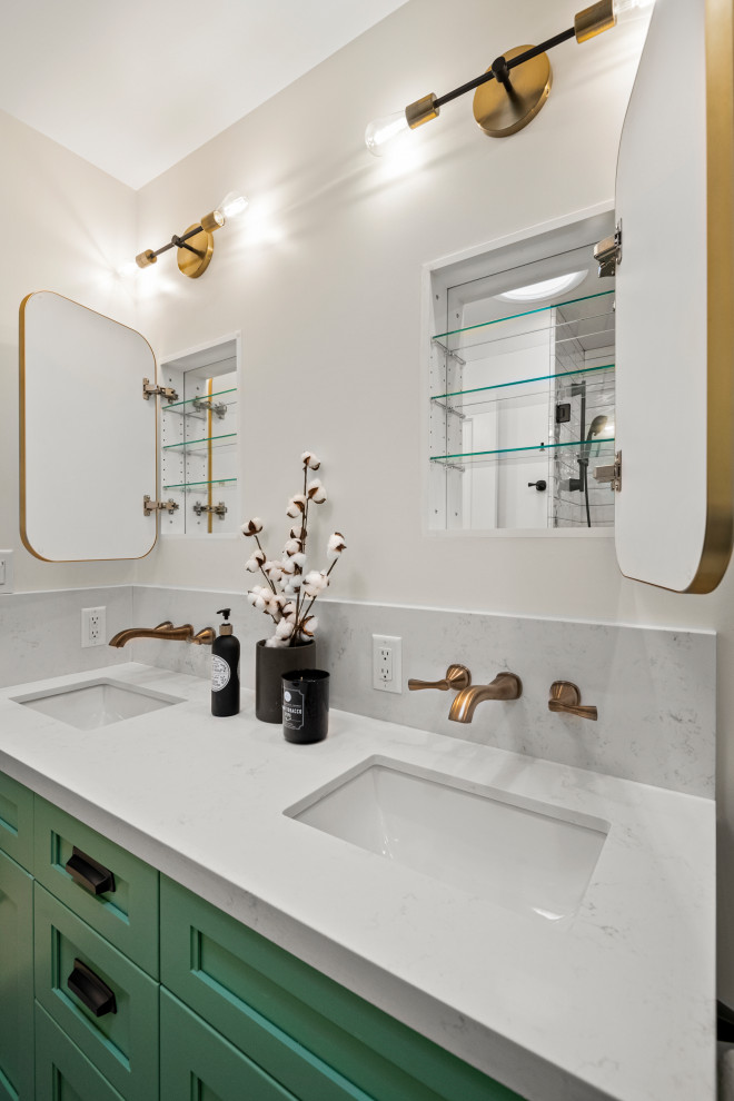 Photo of a large family bathroom in San Francisco with shaker cabinets, green cabinets, an alcove bath, a shower/bath combination, a one-piece toilet, white tiles, porcelain tiles, white walls, a submerged sink, quartz worktops, black floors, a sliding door, white worktops, double sinks, a built in vanity unit and porcelain flooring.