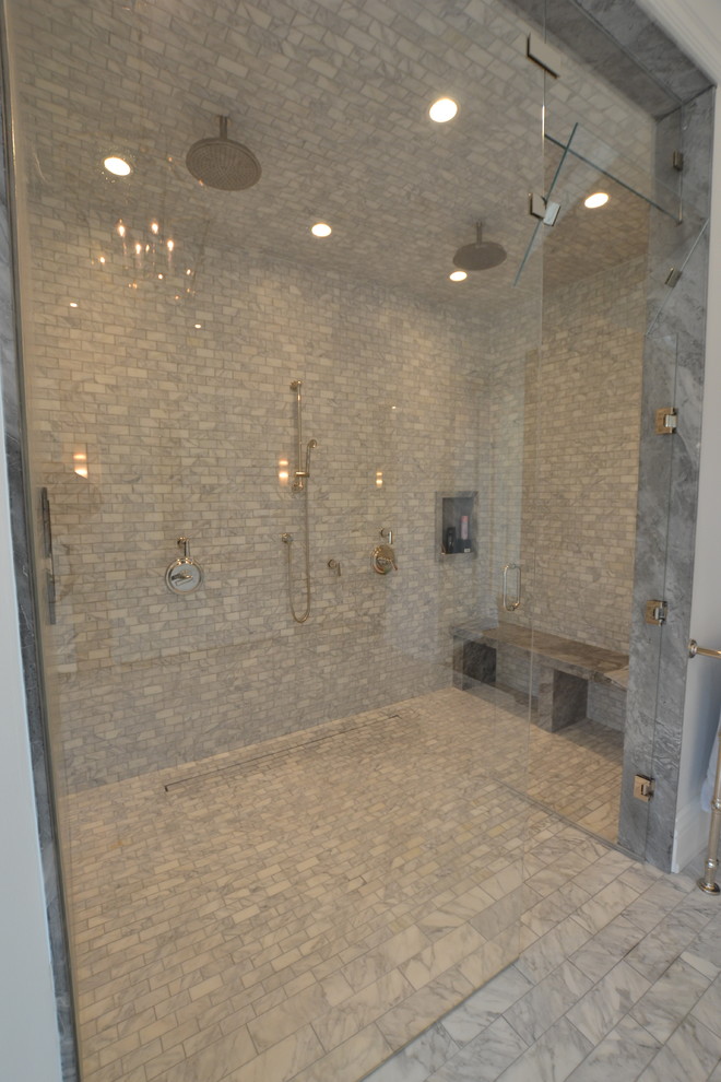 This is an example of a traditional master bathroom in Toronto with shaker cabinets, white cabinets, a freestanding tub, an open shower, a two-piece toilet, white walls, marble floors, an undermount sink, marble benchtops, grey floor and an open shower.