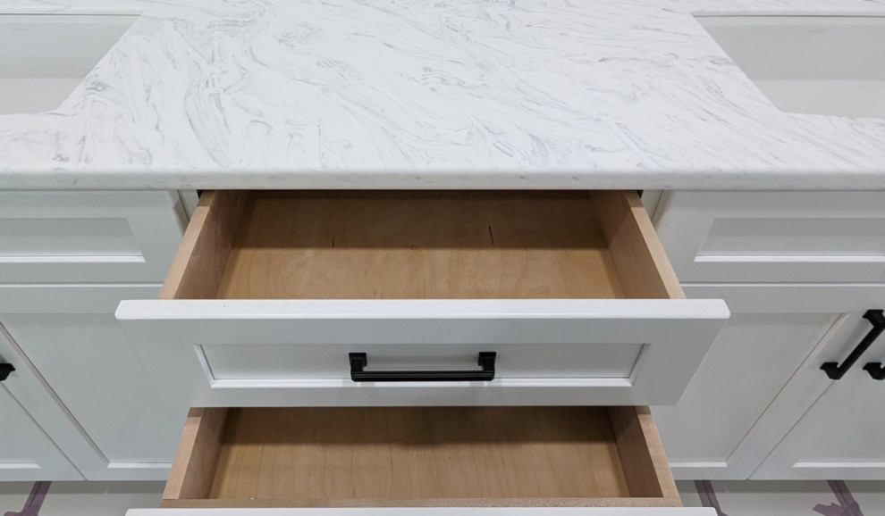 Inspiration for a mid-sized master white floor and double-sink bathroom remodel with flat-panel cabinets, white cabinets, solid surface countertops, white countertops and a built-in vanity