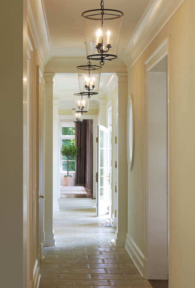 Inspiration for a mediterranean hallway in DC Metro with beige walls.