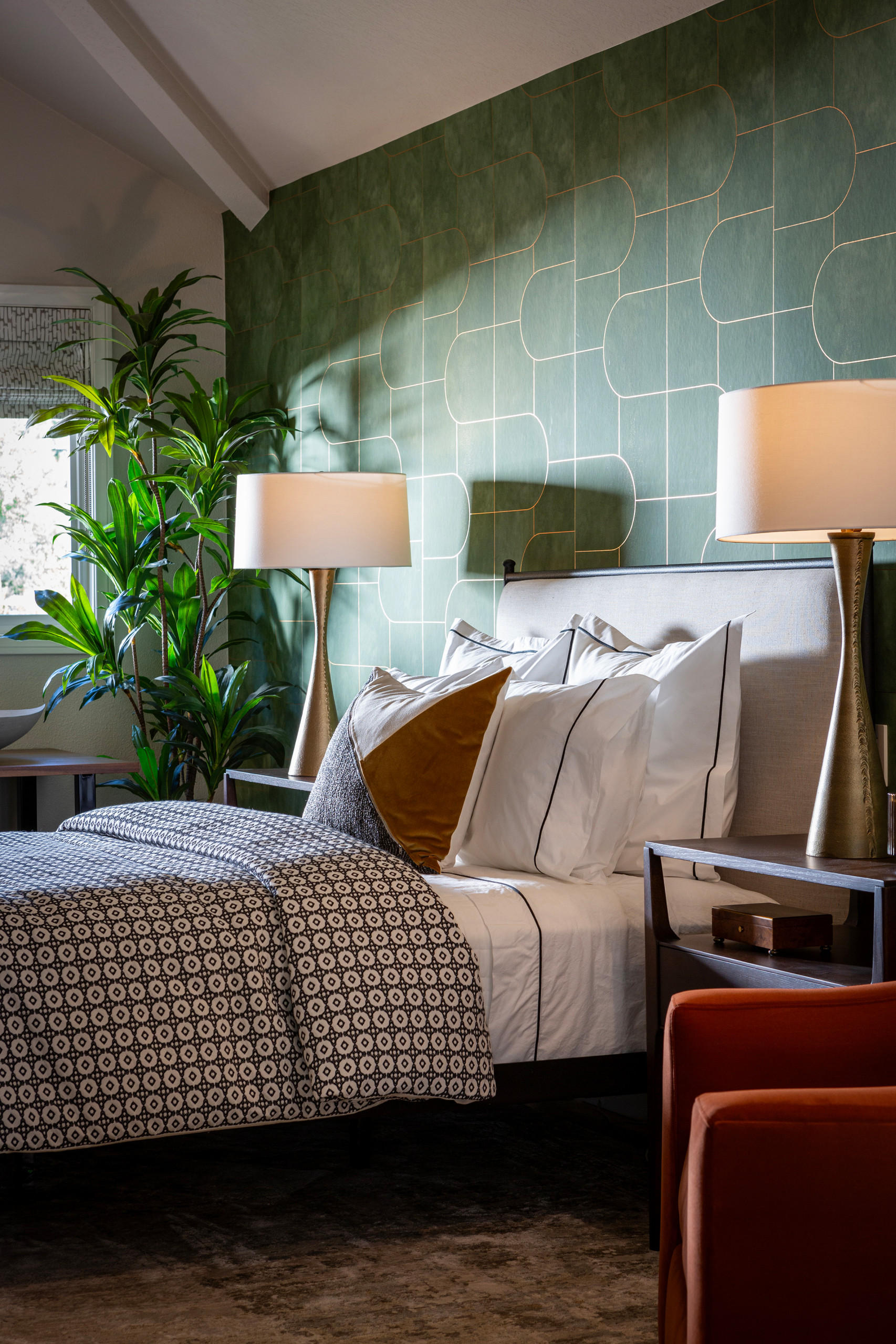 Inspiration for a modern guest medium tone wood floor and wallpaper bedroom remodel in Los Angeles with green walls